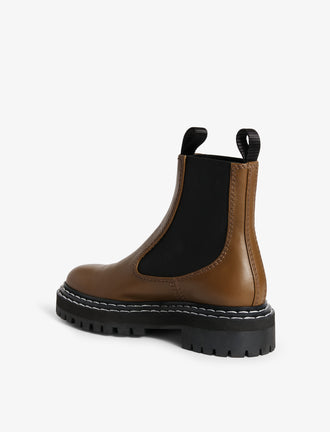 Proenza Schouler Back 3/4 image of Lug Sole Chelsea Boots in khaki
