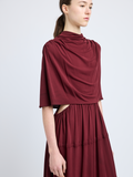 Proenza Schouler Detail image of model wearing Frankie Dress in Matte Jersey in oxblood