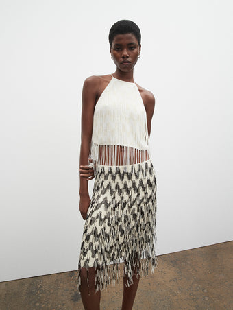 PF23 Collection Look 13: Ecru / White Graphic Embroidered Fringe Top and Black / Ecru Graphic Embroidered Fringe Skirt