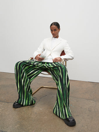 PF23 Collection Look 19: White Viscose Suiting Jacket, White Terry Jersey T-Shirt, Painted Stripe Crepe Pant, Optic White Bar Bag, and Black Stomp Mules