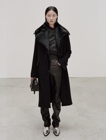 PS24 Look 11 - Black Multi Patti Sweater, Black Nappa Leather Pants, Black Louise Coat With Shearling Collar, Black Small Beacon Saddle Bag, and Silver Bronco Ankle Boots