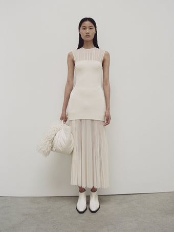 PS24 Look 16 - Ecru Niki Dress, Ivory Large Puffy Nappa Ruched Tote, Cream Bronco Ankle Boots, and Ecru Curly Shearling Scarf