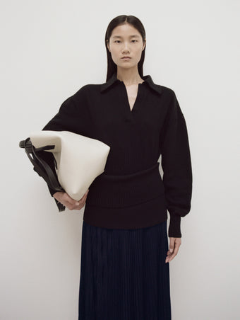 PS24 Look 08 - Black Jeanne Polo, Navy Kiki Skirt, Ivory Large Ps1 Tote, and Cream Glove Lace-ups 55mm