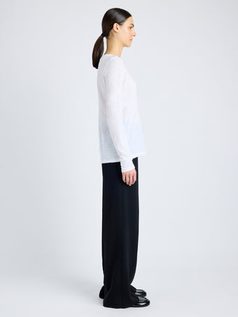 Proenza Schouler Side image of model wearing Solid Tissue Jersey Long Sleeve Tee in WHITE