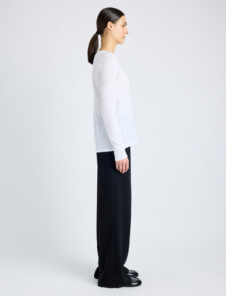 Proenza Schouler Side image of model wearing Solid Tissue Jersey Long Sleeve Tee in WHITE