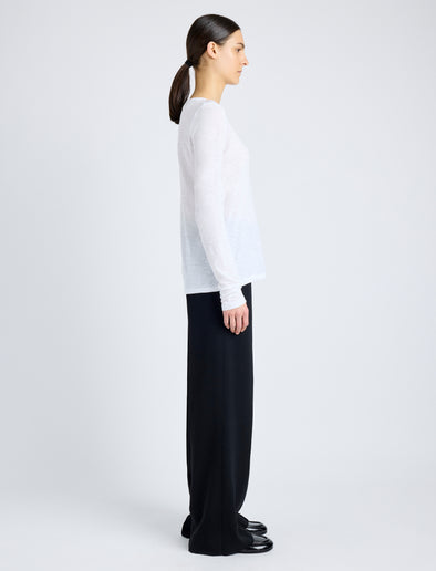 Proenza Schouler Side image of model wearing Solid Tissue Jersey Long Sleeve Tee in WHITE