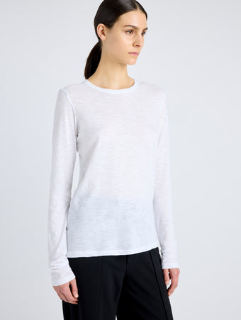 Proenza Schouler Detail image of model wearing Solid Tissue Jersey Long Sleeve Tee in WHITE