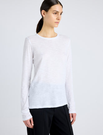 Proenza Schouler Detail image of model wearing Solid Tissue Jersey Long Sleeve Tee in WHITE