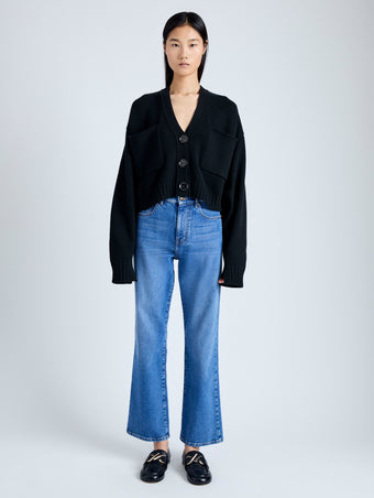 Front image of model wearing Eco Cashmere Cardigan in BLACK