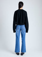 Back image of model wearing Eco Cashmere Cardigan in BLACK
