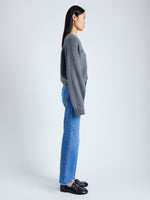 Side image of model wearing Eco Cashmere Cardigan in GREY MELANGE