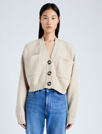 Front cropped image of model wearing Eco Cashmere Cardigan in OATMEAL