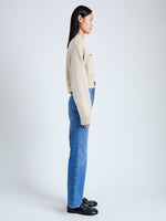 Side image of model wearing Eco Cashmere Cardigan in OATMEAL