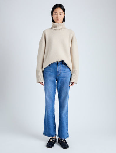 Front image of model wearing Doubleface Eco Cashmere Oversized Turtleneck Sweater in OATMEAL