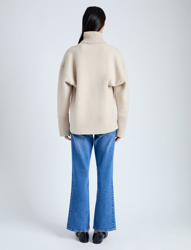 Back image of model wearing Doubleface Eco Cashmere Oversized Turtleneck Sweater in OATMEAL