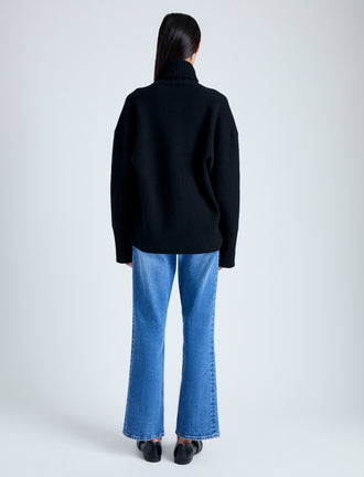 Back image of model wearing Doubleface Eco Cashmere Oversized Turtleneck Sweater in BLACK