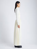 Side image of model wearing Meret Dress In Crepe Jersey in ivory