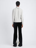 Back image of model wearing Camilla Sweater In Lofty Eco Cashmere in light grey melange