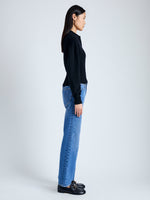 Side image of model in Jeanne Sweater in Eco Cashmere in black