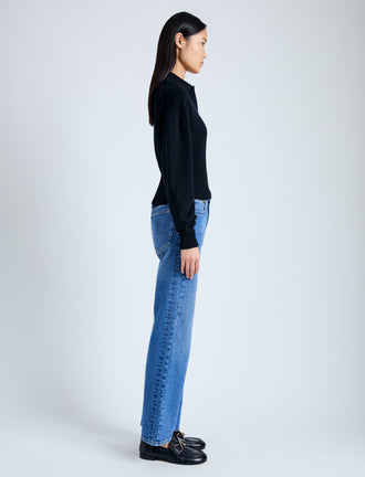 Side image of model in Jeanne Sweater in Eco Cashmere in black
