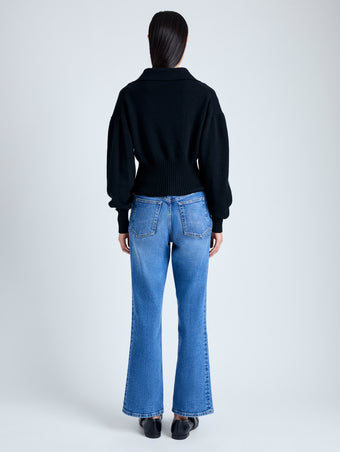 Back image of model in Jeanne Sweater in Eco Cashmere in black