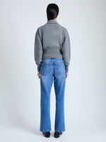 Back image of model wearing Jeanne Polo Sweater in Eco Cashmere in grey melange