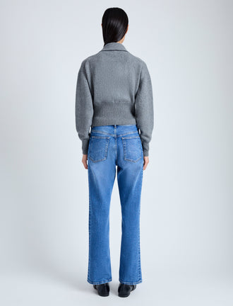 Back image of model wearing Jeanne Polo Sweater in Eco Cashmere in grey melange