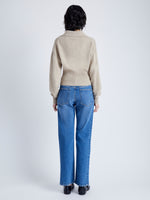 Back image of model wearing Jeanne Sweater In Eco Cashmere in oatmeal