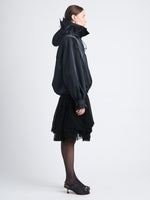 Side image of model wearing Maxwell Anorak In Nylon Gabardine in black
