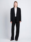 Front image of model wearing Devon Jacket In Viscose Wool in black