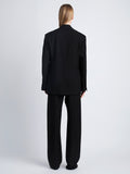 Back image of model wearing Devon Jacket In Viscose Wool in black