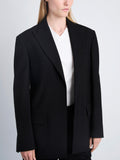 Detail image of model wearing Devon Jacket In Viscose Wool in black