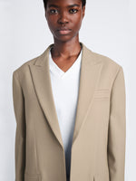 Detail image of model wearing Devon Jacket In Viscose Wool in dark khaki