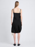 Back full length image of model wearing Emilia Dress In Lightweight Crinkle Poplin in BLACK