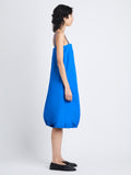 Side full length image of model wearing Emilia Dress In Lightweight Crinkle Poplin in BLUE
