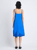 Back full length image of model wearing Emilia Dress In Lightweight Crinkle Poplin in BLUE