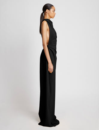 Side image of model in Matte Crepe Backless Dress in black