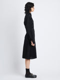 Side image of model in Olympia Dress In Washed Habotai in black