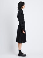 Side image of model in Olympia Dress In Washed Habotai in black
