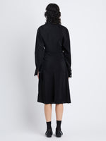 Back image of model in Olympia Dress In Washed Habotai in black
