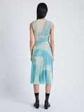 Back image of model wearing Zoe Dress in Printed Nylon Jersey in cyan