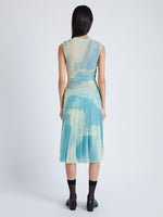 Back image of model wearing Zoe Dress in Printed Nylon Jersey in cyan