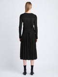 Back image of model wearing Riley Dress In Pleated Jersey in black