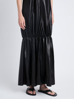 Detail image of model in Margot Dress In Glossy Leather in black