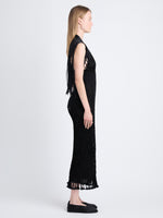 Side image of model wearing Tauba Dress In Satin Ribbon in black