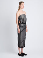 Side image of model wearing Gwen Strapless Dress In Silk Nylon in black