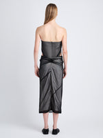 Back image of model wearing Gwen Strapless Dress In Silk Nylon in black