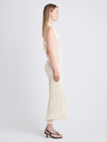 Side image of model wearing Zora Dress In Satin Ribbon in ivory
