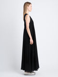 Side image of model wearing Lorna Dress In Viscose Mesh in BLACK