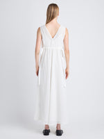 Back full length image of model wearing Lorna Dress In Viscose Mesh in OFF WHITE